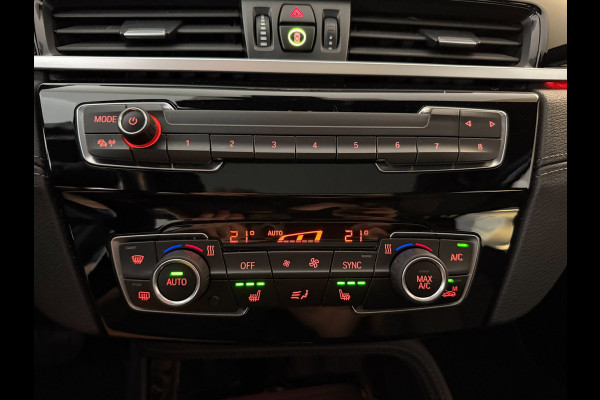 BMW X1 SDrive20i High Executive AIRCO CLIMA NAVI CRUISE PANO LEER STOELVERW HEAD UP TREKHAAK 1800KG CAMERA ELEK KLEP NIEUWSTAAT