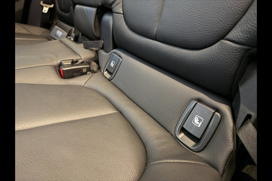 BMW X1 SDrive20i High Executive AIRCO CLIMA NAVI CRUISE PANO LEER STOELVERW HEAD UP TREKHAAK 1800KG CAMERA ELEK KLEP NIEUWSTAAT