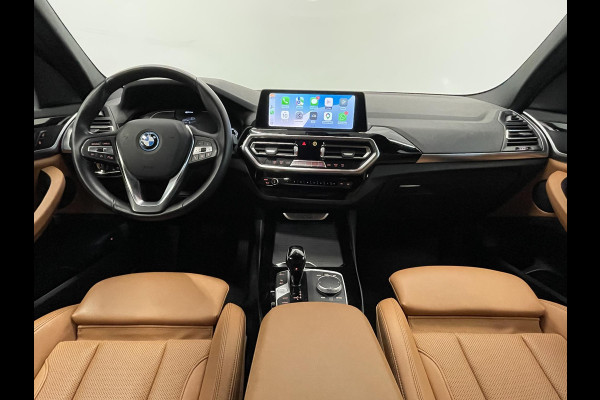 BMW X3 xDrive30e Trekhaak PDC VA + Camera Sportstoelen 19" M-Sport Stoelverwarming Cognac Leder Bekleding Privacy Glass DAB+ Navi Carplay Cruise Control