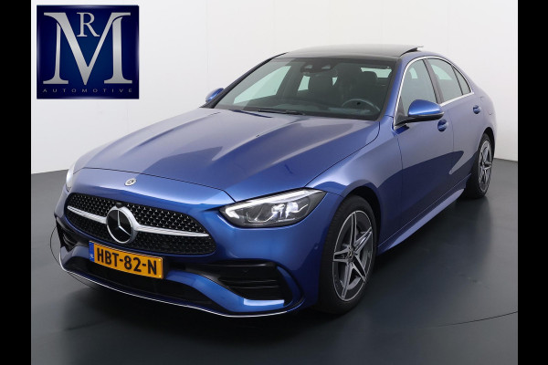 Mercedes-Benz C-Klasse 300 e AMG Line Limited PHEV | PANORAMADAK | DISTRONIC (ACC) | ACHTERUITRIJCAMERA | DODEHOEKASSISTENT | AMBIENT LIGHTING | MERCEDES-DEALER ONDERHOUDEN | RIJKLAAR MET 12 MAANDEN BOVAG GARANTIE |