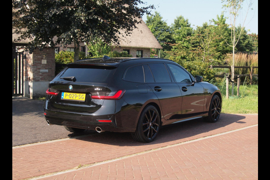 BMW 3 Serie Touring 318i Business Edition | Black Optic | Apple Carplay | Sfeerverlichting | Parkeersensoren | NL-Auto |