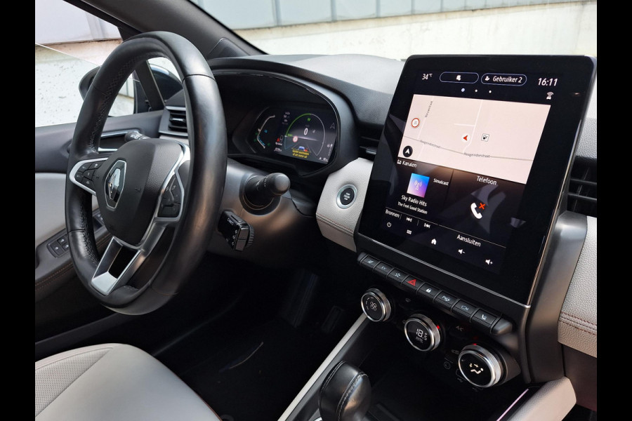 Renault Clio 1.6 E-Tech Hybrid 140 Initiale Paris | HEV | Leder | Blindspot | 360 Cam | stuur/stoel verwarming |