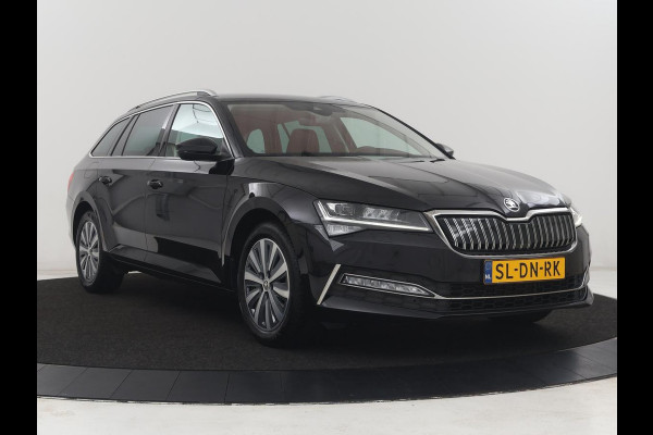 Škoda Superb Combi 1.4 TSI iV Business Edition | SOH 91.2% | Trekhaak | Memory | Stuur/stoel verwarming | Achterbank verwarming | Adaptive cruise | Carplay | DAB | Verwarmde voorruit | Matrix LED | Camera |