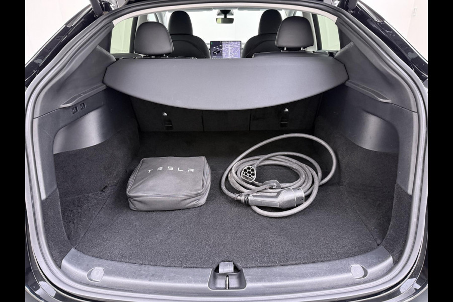 Tesla Model Y RWD 58 kWh AFNEEMBARE TREKHAAK | FABRIEKSGARANTIE OP ACCU & AANDRIJFLIJN TOT 03-2031 OF 160.000 KM | CARBON LIJSTEN |