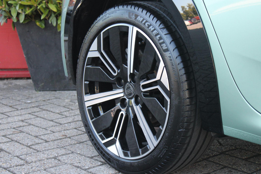 Lancia Ypsilon 1.2 Hybrid 110PK AUTOMAAT LX | CAMERA VOOR + ACHTER | PARKEERSENSOREN VOOR + ACHTER | DRIVE PACK: ADAPTIVE CRUISE CONTROL/DODEHOEK DETECTIE/ELEKTRISCH INKLAPBARE BUITENSPIEGELS/SPROTIEF STUURWIEL | SFEER VERLICHTING | CLIMATE CONTROL | DRAADLOZE APPLE CARPLAY/ANDROID AUTO | DRAADLOZE TELEFOONLADER | 17"  LICHTMETALEN VELGEN "DIAMOND CUT" | WIELKASTEN "GLOSSY BLACK" | PRIVACY GLAS ACHTER | PREMIUM STOELBEKLEDING "GRIGIO ANTRACITE" | KLEUR: "VERDER GIADA" |