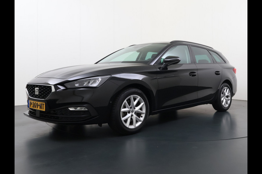 Seat Leon Sportstourer 1.5TSI 131PK Adap.Cruise Trekhaak 3-Zone Ecc Camera Navi Apple Carplay Android Auto Pdc Style Business Intense Lmv Led Bluetooth Keyless Isofix 1.400KG Trekgewicht Rijstrooksensor 1e Eigenaar Dealeronderhouden Origineel Nederlandse Auto