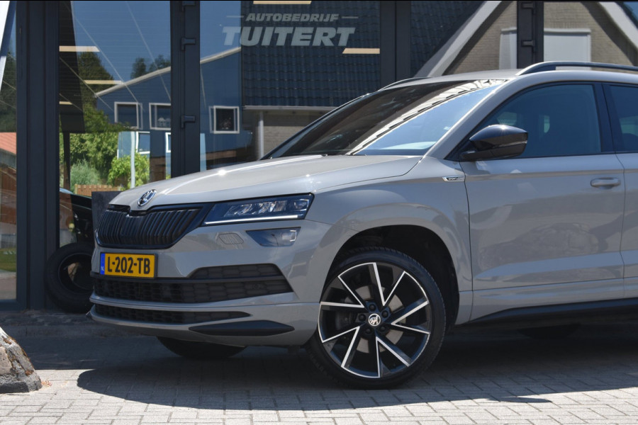 Škoda Karoq 1.5 TSI ACT Sportline | TREKHAAK | STEEL GREY | ADAPTIEVE CRUISE CONTROLE | CAMERA | NAP | STOELVERWARMING | CANTON