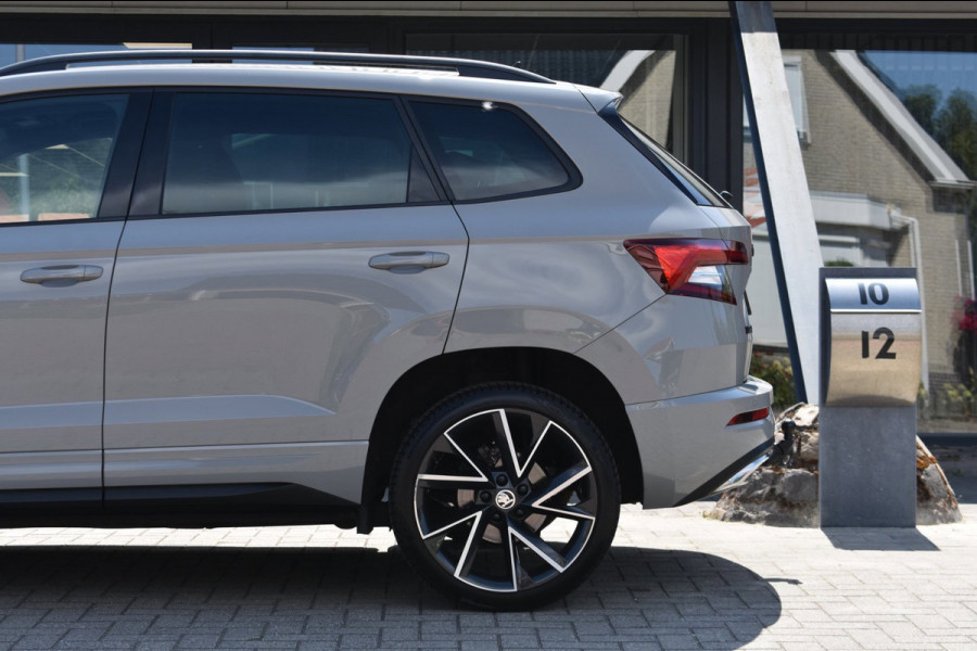 Škoda Karoq 1.5 TSI ACT Sportline | TREKHAAK | STEEL GREY | ADAPTIEVE CRUISE CONTROLE | CAMERA | NAP | STOELVERWARMING | CANTON