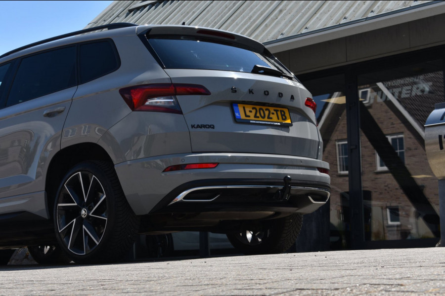 Škoda Karoq 1.5 TSI ACT Sportline | TREKHAAK | STEEL GREY | ADAPTIEVE CRUISE CONTROLE | CAMERA | NAP | STOELVERWARMING | CANTON