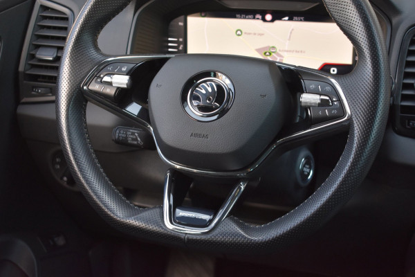 Škoda Karoq 1.5 TSI ACT Sportline | TREKHAAK | STEEL GREY | ADAPTIEVE CRUISE CONTROLE | CAMERA | NAP | STOELVERWARMING | CANTON