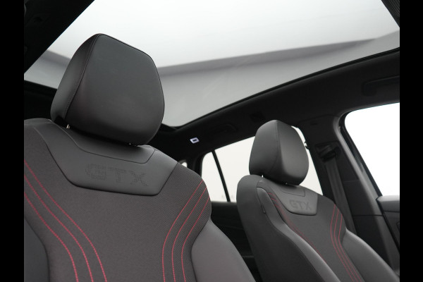 Volkswagen ID.4 GTX 4Motion 77 kWh 300pk Dealer O.H. | Trekhaak Af Fabriek | Panodak | Adaptive Cruise | IQ Light | Sportstoelen Verwarmd | Sfeerverlichting | Apple Carplay | Navigatie | DAB | 21".M | Virtual Cockpit |