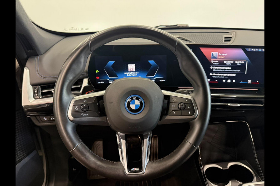 BMW iX1 eDrive20 67 kWh M Sport Edition 204pk Camera PDC Stoelverwarming Navi Hifi 18 inch M Velgen Adaptief M Onderstel