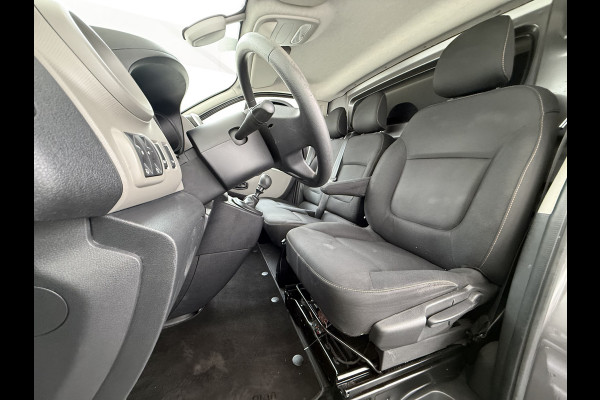 Renault Trafic 1.6dCi T29 L2H1 3-Persoons Trekhaak Euro 6 Navi Airco Cruise Control Bluetooth Pdc Comfort Regen-Lichtsensor Betonplex Vloer Lat om Lat Wandbetimmering Schuifdeur 2.000KG Trekgewicht Origineel Nederlandse Auto