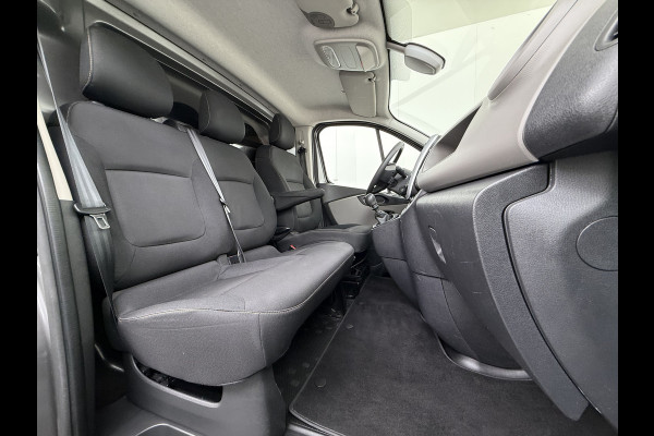 Renault Trafic 1.6dCi T29 L2H1 3-Persoons Trekhaak Euro 6 Navi Airco Cruise Control Bluetooth Pdc Comfort Regen-Lichtsensor Betonplex Vloer Lat om Lat Wandbetimmering Schuifdeur 2.000KG Trekgewicht Origineel Nederlandse Auto