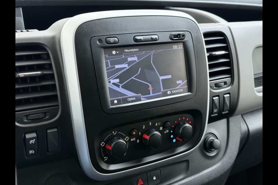 Renault Trafic 1.6dCi T29 L2H1 3-Persoons Trekhaak Euro 6 Navi Airco Cruise Control Bluetooth Pdc Comfort Regen-Lichtsensor Betonplex Vloer Lat om Lat Wandbetimmering Schuifdeur 2.000KG Trekgewicht Origineel Nederlandse Auto