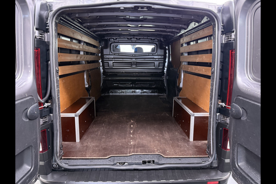 Renault Trafic 1.6dCi T29 L2H1 3-Persoons Trekhaak Euro 6 Navi Airco Cruise Control Bluetooth Pdc Comfort Regen-Lichtsensor Betonplex Vloer Lat om Lat Wandbetimmering Schuifdeur 2.000KG Trekgewicht Origineel Nederlandse Auto