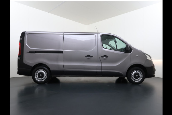 Renault Trafic 1.6dCi T29 L2H1 3-Persoons Trekhaak Euro 6 Navi Airco Cruise Control Bluetooth Pdc Comfort Regen-Lichtsensor Betonplex Vloer Lat om Lat Wandbetimmering Schuifdeur 2.000KG Trekgewicht Origineel Nederlandse Auto
