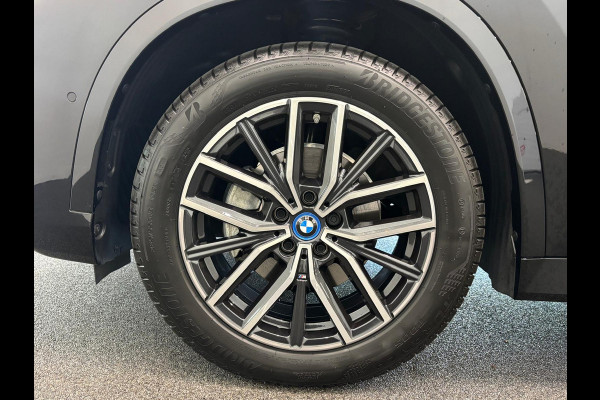 BMW iX1 eDrive20 67 kWh M Sport Edition 204pk Camera PDC Stoelverwarming Navi Hifi 18 inch M Velgen Adaptief M Onderstel