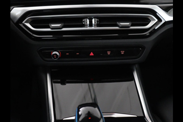 BMW i4 eDrive40 84 kWh | SOH 93,8% | Camera | Adaptive cruise | Climate control | Navigatie | DAB+ | Bluetooth | Stoelverwarming | Carplay