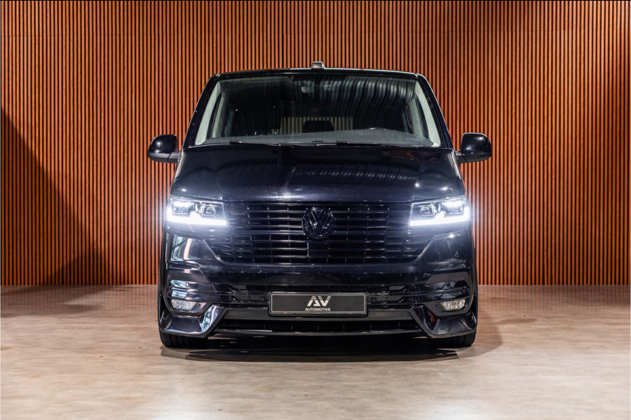 Volkswagen Transporter 2.0 TDI L2H1 DC Caravelle | LeightonVans Bodykit | ACC | Bi-Xenon | Elek deuren | Lederen bekleding | Camera | CarPlay | Navigatie | Trekhaak | Nieuwe APK