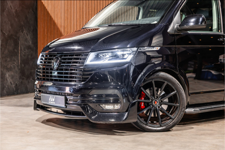 Volkswagen Transporter 2.0 TDI L2H1 DC Caravelle | LeightonVans Bodykit | ACC | Bi-Xenon | Elek deuren | Lederen bekleding | Camera | CarPlay | Navigatie | Trekhaak | Nieuwe APK