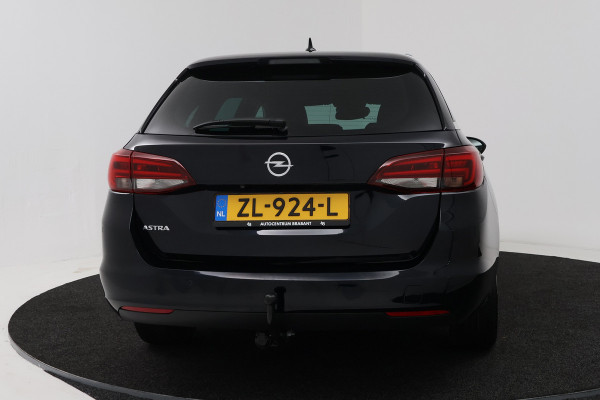 Opel Astra Sports Tourer 1.0 Turbo Business Executive (TREKHAAK, CAMERA, STOEL/STUUR VERWARMING, NAVIGATIE, PARKEERSENSOREN)