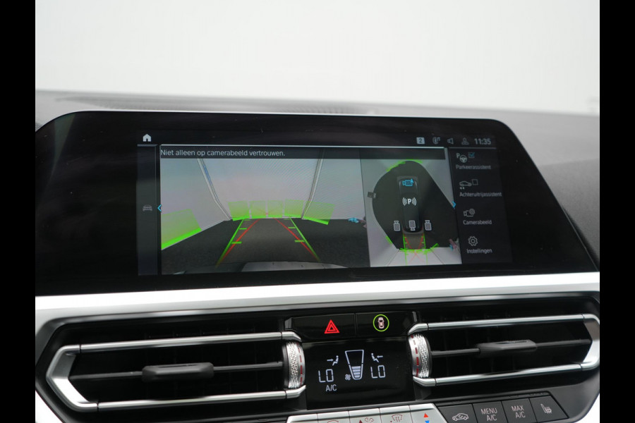 BMW 3 Serie Touring 330e Sportline PHEV 293pk Dealer O.H. | Panodak | Adaptive Cruise | Head Up | Laser LED | 360 Camera | Lederen Sportstoelen Memory & Verwarmd | Stuur Verwarmd | Sfeerverlichting | Keyless | Blis | Apple Carplay | Hifi Audio | Plug In Hybrid |