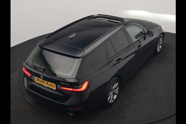 BMW 3 Serie Touring 330e Sportline PHEV 293pk Dealer O.H. | Panodak | Adaptive Cruise | Head Up | Laser LED | 360 Camera | Lederen Sportstoelen Memory & Verwarmd | Stuur Verwarmd | Sfeerverlichting | Keyless | Blis | Apple Carplay | Hifi Audio | Plug In Hybrid |