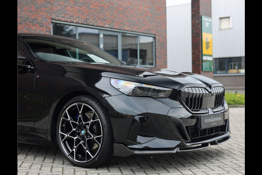 BMW 5 Serie Touring 550e xDrive | M Performance - Pano - B&W