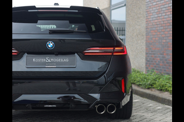 BMW 5 Serie Touring 550e xDrive | M Performance - Pano - B&W