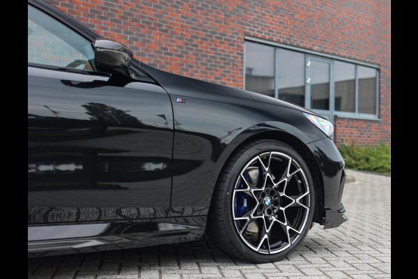 BMW 5 Serie Touring 550e xDrive | M Performance - Pano - B&W