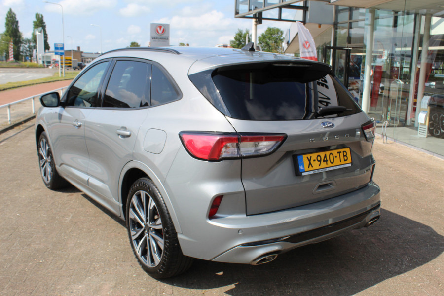 Ford Kuga 2.5 PHEV ST-Line X , 1500kg Trekgewicht , Slechts 35000km Navigatie, Stoel,stuur en voorruitverwarming, Climate control Trekhaak , Bluetooth , Head-up display , BenO audio systeem