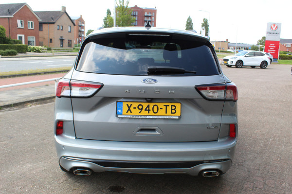 Ford Kuga 2.5 PHEV ST-Line X , 1500kg Trekgewicht , Slechts 35000km Navigatie, Stoel,stuur en voorruitverwarming, Climate control Trekhaak , Bluetooth , Head-up display , BenO audio systeem