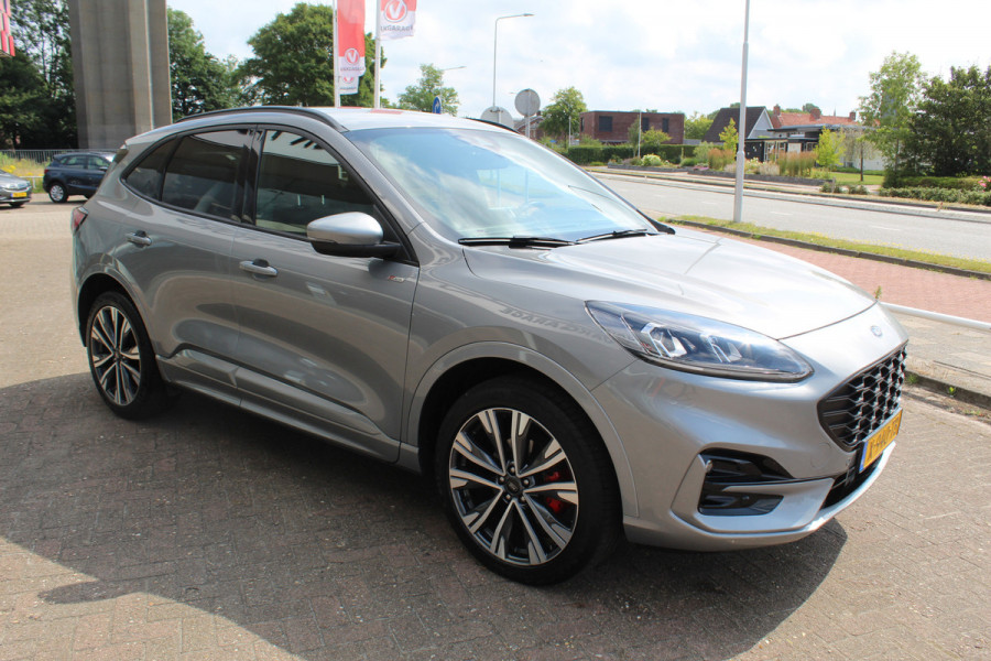 Ford Kuga 2.5 PHEV ST-Line X , 1500kg Trekgewicht , Slechts 35000km Navigatie, Stoel,stuur en voorruitverwarming, Climate control Trekhaak , Bluetooth , Head-up display , BenO audio systeem