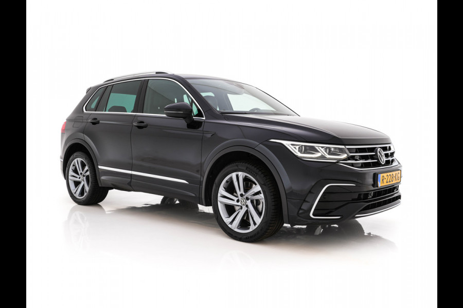 Volkswagen Tiguan 1.4 TSI eHybrid R-Line Business+ (Plug-in) (INCL-BTW) Aut. *LEATHER-FABRIC | FULL-LED | ADAPTIVE-CRUISE | CAMERA | DIGI-COCKPIT | KEYLESS | PRIVACY-GLASS | SPORTSEATS | SHIFTPADDLES | NAVI-FULLMAP | ECC | PDC | 19''ALU*
