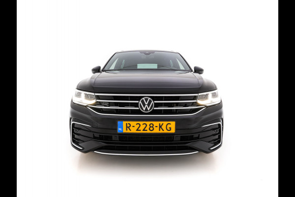 Volkswagen Tiguan 1.4 TSI eHybrid R-Line Business+ (Plug-in) (INCL-BTW) Aut. *LEATHER-FABRIC | FULL-LED | ADAPTIVE-CRUISE | CAMERA | DIGI-COCKPIT | KEYLESS | PRIVACY-GLASS | SPORTSEATS | SHIFTPADDLES | NAVI-FULLMAP | ECC | PDC | 19''ALU*