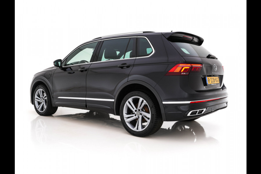 Volkswagen Tiguan 1.4 TSI eHybrid R-Line Business+ (Plug-in) (INCL-BTW) Aut. *LEATHER-FABRIC | FULL-LED | ADAPTIVE-CRUISE | CAMERA | DIGI-COCKPIT | KEYLESS | PRIVACY-GLASS | SPORTSEATS | SHIFTPADDLES | NAVI-FULLMAP | ECC | PDC | 19''ALU*