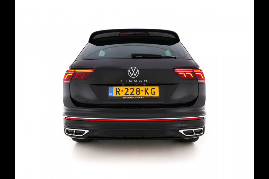 Volkswagen Tiguan 1.4 TSI eHybrid R-Line Business+ (Plug-in) (INCL-BTW) Aut. *LEATHER-FABRIC | FULL-LED | ADAPTIVE-CRUISE | CAMERA | DIGI-COCKPIT | KEYLESS | PRIVACY-GLASS | SPORTSEATS | SHIFTPADDLES | NAVI-FULLMAP | ECC | PDC | 19''ALU*