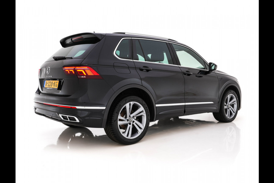 Volkswagen Tiguan 1.4 TSI eHybrid R-Line Business+ (Plug-in) (INCL-BTW) Aut. *LEATHER-FABRIC | FULL-LED | ADAPTIVE-CRUISE | CAMERA | DIGI-COCKPIT | KEYLESS | PRIVACY-GLASS | SPORTSEATS | SHIFTPADDLES | NAVI-FULLMAP | ECC | PDC | 19''ALU*