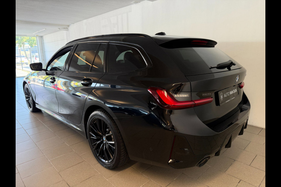 BMW 3 Serie Touring 330e G21 Touring LCI 292PK XTRA BOOST LONG RANGE FACELIFT PANO LEER TREKHAAK HARMAN KARDON SHADOWLINE NIEUWSTA