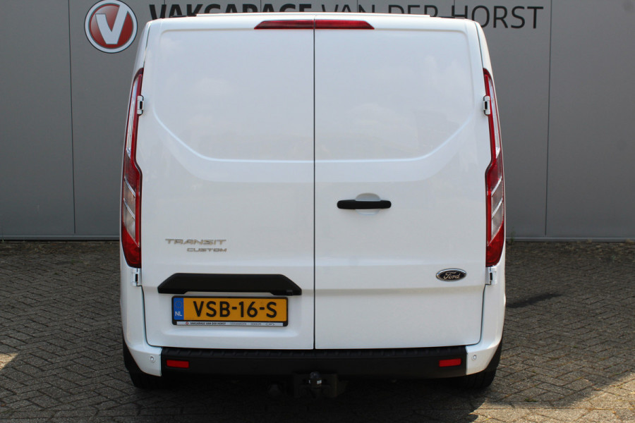 Ford Transit Custom 300 2.0-108pk TDCI L2H1 Trend. Erg nette Ford Transit Custom, die u nog jaren van dienst kan zijn ! Airco, voorraamverw., trekhaak, cruise control, camera, parkeersensoren v+a, 3-zits, laadruimte betimmerd etc.
