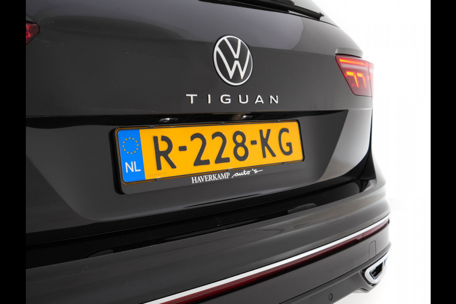 Volkswagen Tiguan 1.4 TSI eHybrid R-Line Business+ (Plug-in) (INCL-BTW) Aut. *LEATHER-FABRIC | FULL-LED | ADAPTIVE-CRUISE | CAMERA | DIGI-COCKPIT | KEYLESS | PRIVACY-GLASS | SPORTSEATS | SHIFTPADDLES | NAVI-FULLMAP | ECC | PDC | 19''ALU*