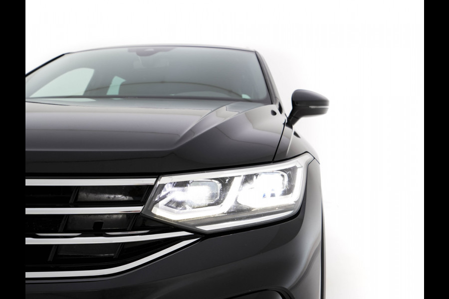 Volkswagen Tiguan 1.4 TSI eHybrid R-Line Business+ (Plug-in) (INCL-BTW) Aut. *LEATHER-FABRIC | FULL-LED | ADAPTIVE-CRUISE | CAMERA | DIGI-COCKPIT | KEYLESS | PRIVACY-GLASS | SPORTSEATS | SHIFTPADDLES | NAVI-FULLMAP | ECC | PDC | 19''ALU*