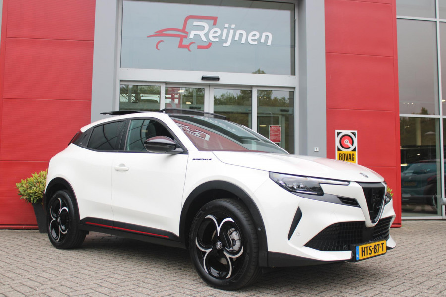 Alfa Romeo junior 1.2 145PK AUTOMAAT Hybrid IBRIDA SPECIALE | PANORAMA SCHUIF/KANTEL DAK | AFNEEMBARE TREKHAAK | TECHNO PACK: LED MATRIX KOPLAMPEN/AUTOMATISCH DIMMENDE BINNENSPIEGEL/DRAADLOZE TELEFOONLADER/ELEKTRISCH VERSTELBARE EN VERWARMBARE ZIJSPIEGELS MET DODEHOEK DETECTIE, ELEKTRISCH INKLAPBAAR/NAVIGATIE/HANDS-FREE ACHTERKLEP/KEYLESS ENTRY/USB TYPE C/ADAPTIVE CRUISE CONTROL MET LANE CENTERING EN FILE-ASSISTENT/ACHTERUITRIJ CAMERA MET DYNAMISCHE RIJLIJNEN/AUDIOSYSTEEM MET 6 SPEAKERS | PREMIUM PACK: "SPIGA" STOFFEN/ECOLEDER BEKLEDING MET RODE ACCENTEN - 6-VOUDIG ELEKTRISCH VERSTELBAR