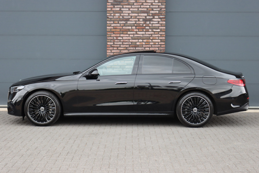 Mercedes-Benz E-Klasse 400 e 4MATIC AMG Line | Luchtvering | Achterasbesturing | Hyperscreen | Distronic+ | Trekhaak | Digital Light | HUD | Burmester | Achterbank Verwarmd |3D-Display |