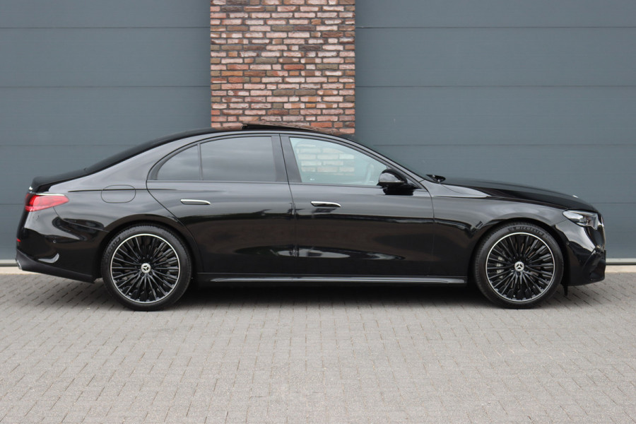 Mercedes-Benz E-Klasse 400 e 4MATIC AMG Line | Luchtvering | Achterasbesturing | Hyperscreen | Distronic+ | Trekhaak | Digital Light | HUD | Burmester | Achterbank Verwarmd |3D-Display |