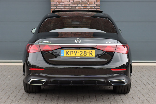 Mercedes-Benz E-Klasse 400 e 4MATIC AMG Line | Luchtvering | Achterasbesturing | Hyperscreen | Distronic+ | Trekhaak | Digital Light | HUD | Burmester | Achterbank Verwarmd |3D-Display |