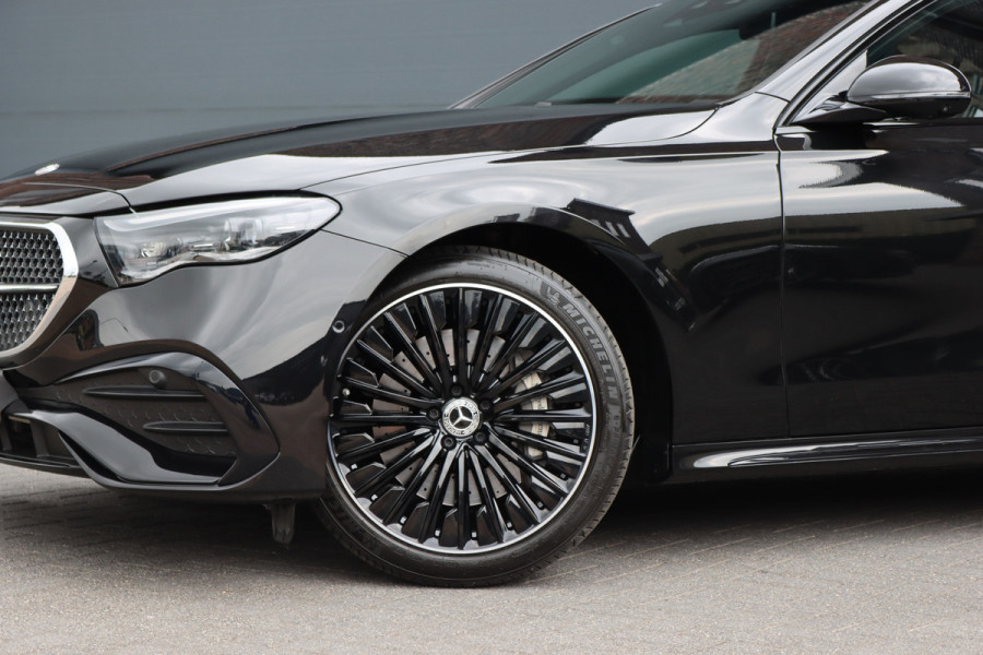 Mercedes-Benz E-Klasse 400 e 4MATIC AMG Line | Luchtvering | Achterasbesturing | Hyperscreen | Distronic+ | Trekhaak | Digital Light | HUD | Burmester | Achterbank Verwarmd |3D-Display |