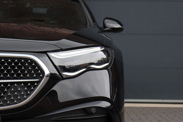 Mercedes-Benz E-Klasse 400 e 4MATIC AMG Line | Luchtvering | Achterasbesturing | Hyperscreen | Distronic+ | Trekhaak | Digital Light | HUD | Burmester | Achterbank Verwarmd |3D-Display |