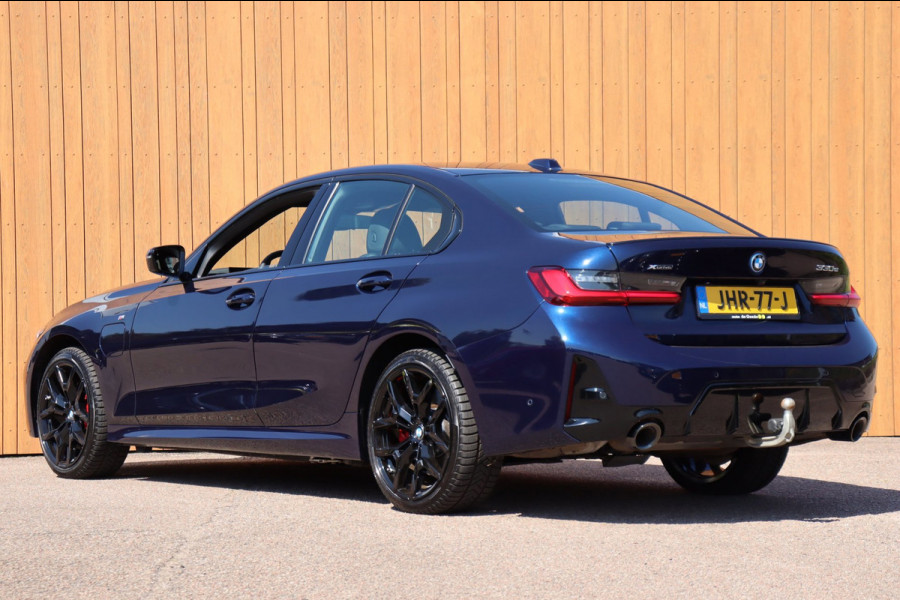 BMW 3 Serie 330E xDrive M-sport Pro Tansanitblau HUD ambiance verl. leer+vw stuurverw el.klep camera's
